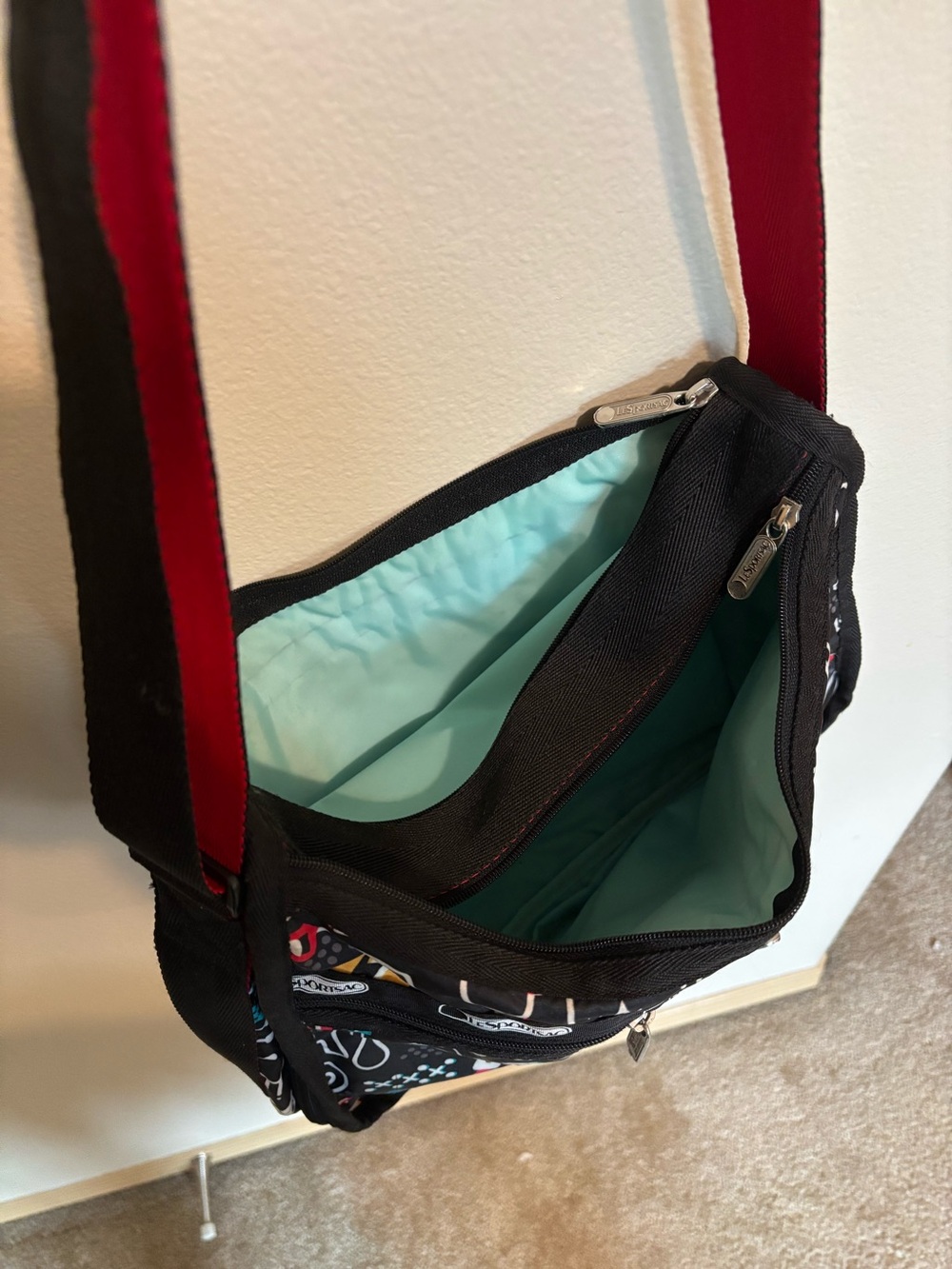 LeSportsac Deluxe Everyday Bag: Black with fun alien print. - Picture 3 of 4